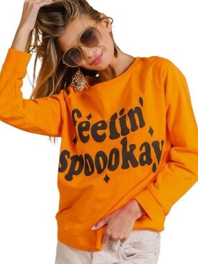 562:  BIBI NWT FEELIN’ SPOOKAY’ SWEATSHIRT ORANGE (H10)